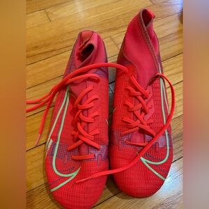 Nike Red Soccer Athletic Shoes with Green Accents